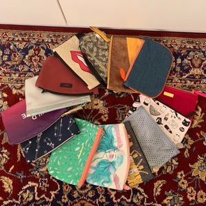 A TON OF UNUSED IPSY BAGS